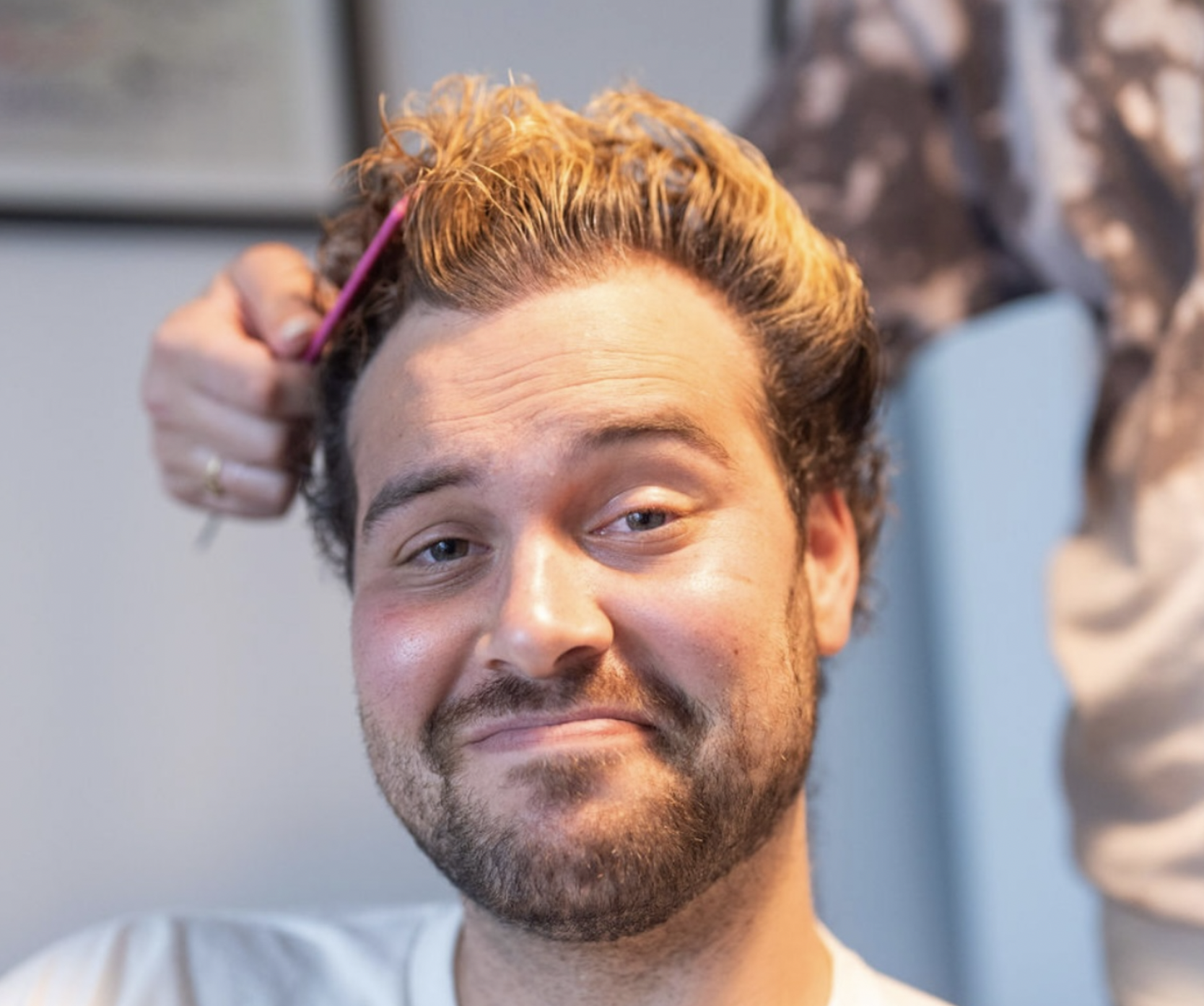 David with frosted tips hairstyle after fundraiser vote