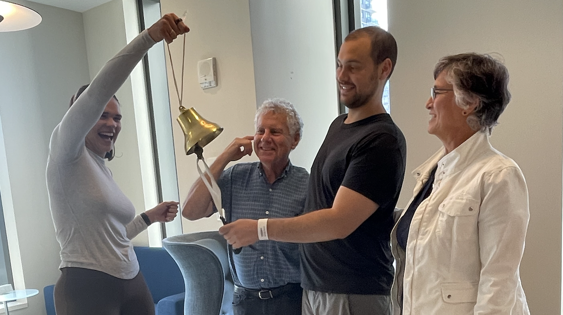 David with his parents and Mikayla celebrating the final chemo treatment