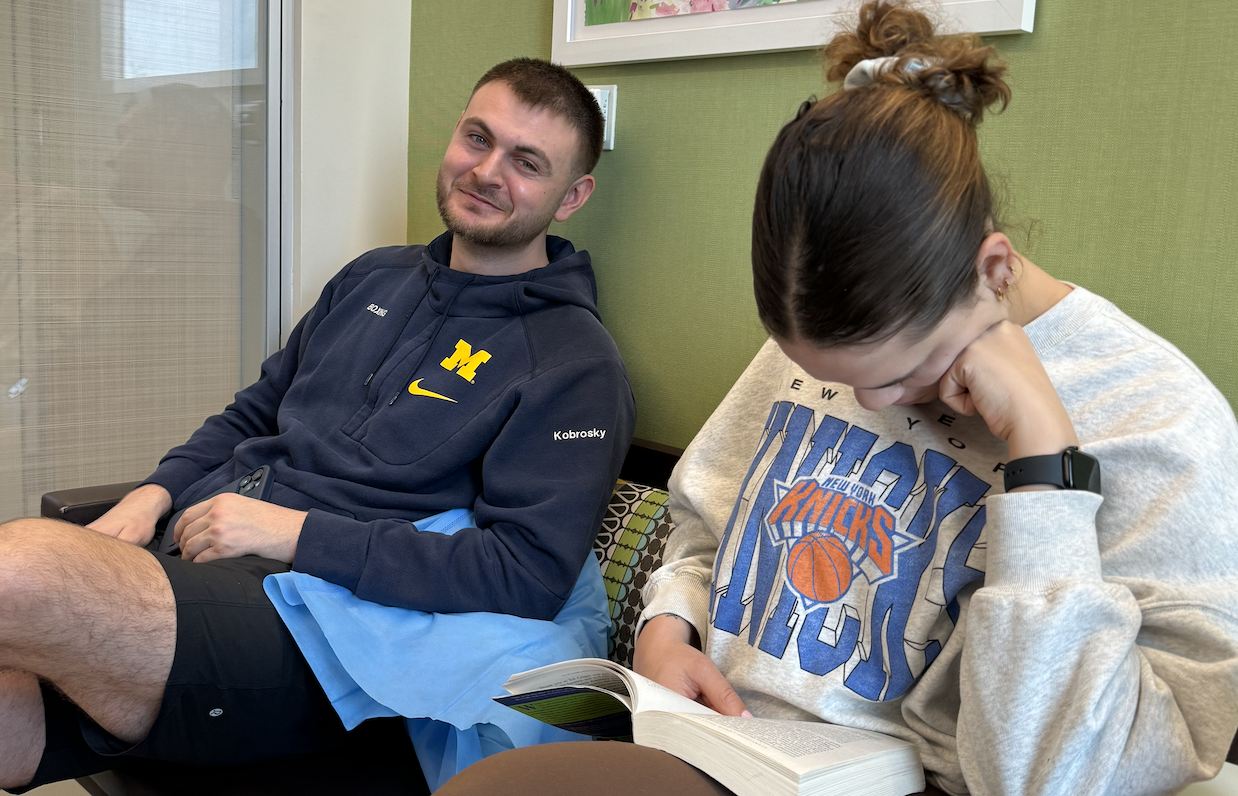 Dave and Mikayla reading during chemo