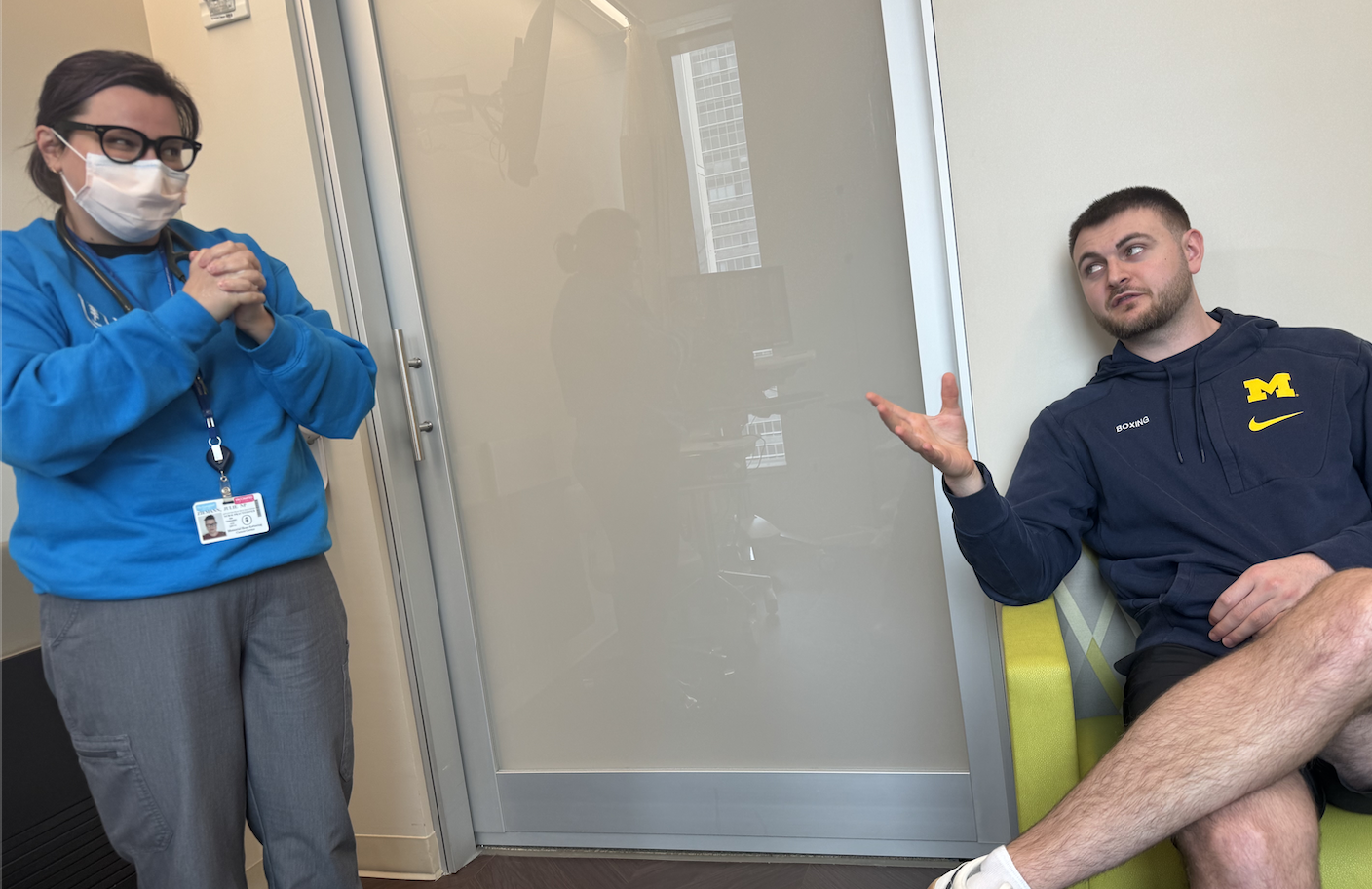 Dave wearing Michigan sweatshirt at hospital