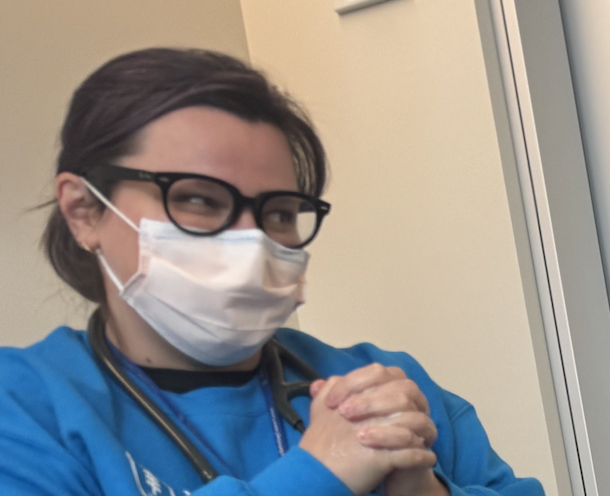 Nurse with restrained expression